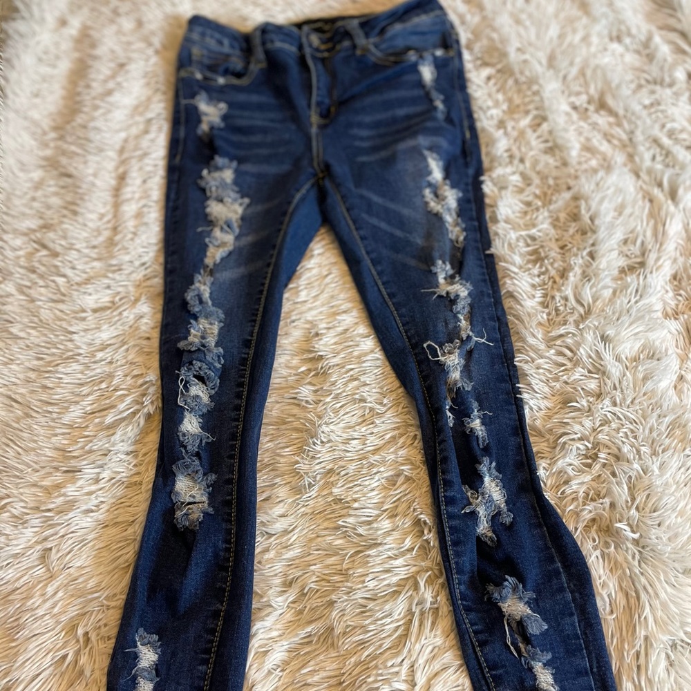 Ripped mid rise jeans